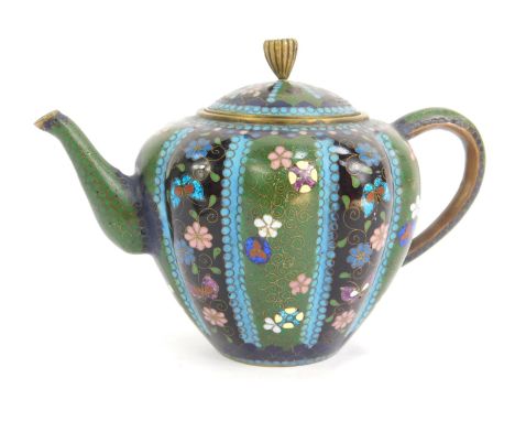 A late 19thC Chinese cloisonne enamel teapot, of lobed form, decorated with flowers and butterflies on a blue, black, green, 