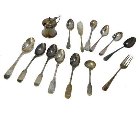 Georgian and later silver tea spoons, fork, butter knife, and a mustard pot, 8.21oz.