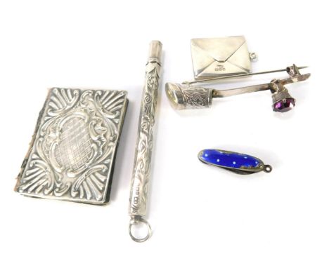 A group of silver and other trinkets and jewellery, comprising a silver Scottish brooch set with paste stone, lacking horn ce