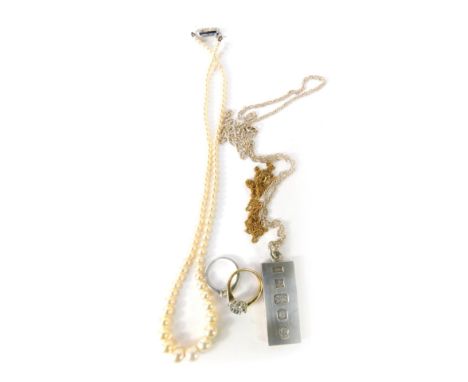 A group of costume jewellery, comprising a silver ingot pendant and chain, a silver and cz set dress ring, 41.9g all in, an M