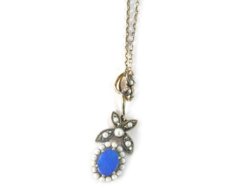 A silver opal cultured pearl and marcasite pendant and chain, the floral drop designed with butterflies and flower head, 3.5c