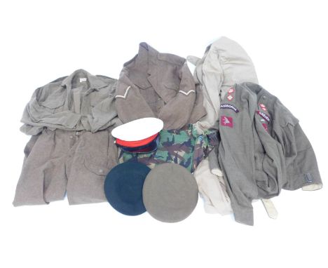 A group of Army uniforms and dress uniforms, to include two berets, a dress cap size 6⅞?, a tunic drill khaki size 24, a Lady