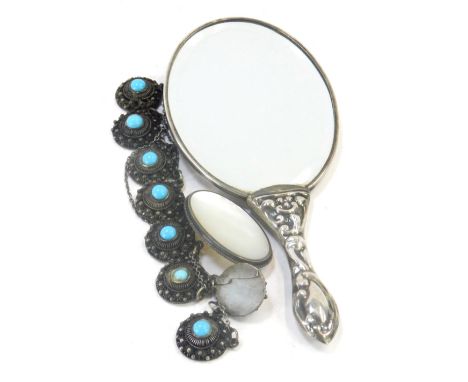 Silver jewellery and trinkets, comprising a white metal handled single hand mirror, floral embossed back, unmarked, a silver 