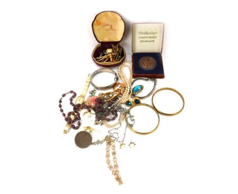 A group of costume jewellery, comprising Aviva and other lady's wristwatches, cultured pearl pendants, hammered silver bangle