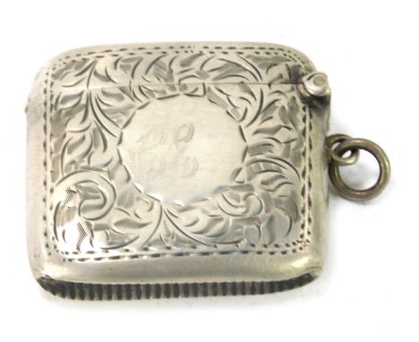A George V silver vesta case, of large proportion, with curved scroll body, with etched scroll design and match strike base, 