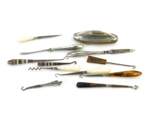A silver nail buffer, silver handled manicure set, mother of pearl handled pieces, etc. (a quantity) 