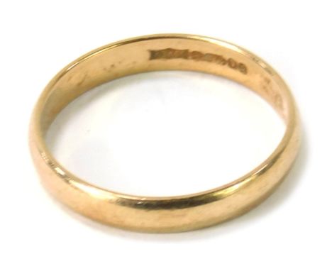 A 9ct gold wedding band, of plain design, London 1924, ring size Q, 2g. 