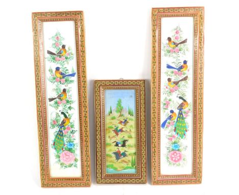 Three Eastern pictures, comprising two painted porcelain panels of birds, 44cm x 9cm, and a further hunting scene, 24cm x 8cm