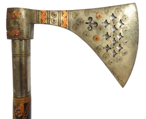 A Middle Eastern axe, with a shaped steel and pierced blade, with a carved and ebonised handle, 85cm long. 