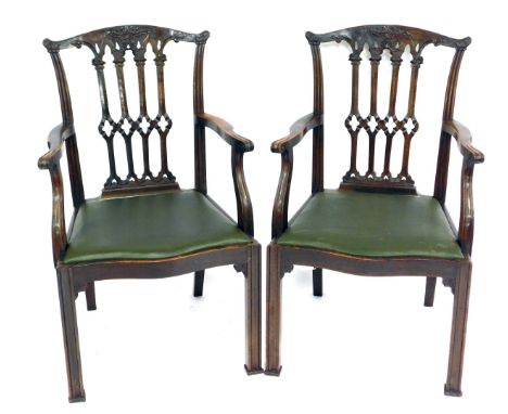 A pair of 19thC Gothic Chippendale style carver chairs, with drop in seats, 63cm wide.