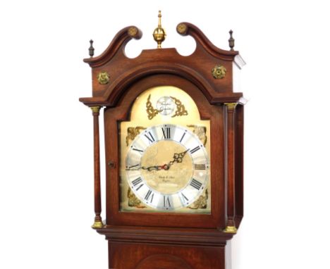 Charles E Short of Brighton. A 20thC mahogany long case clock, break arch dial with brass cherub spandrels, silvered chapter 