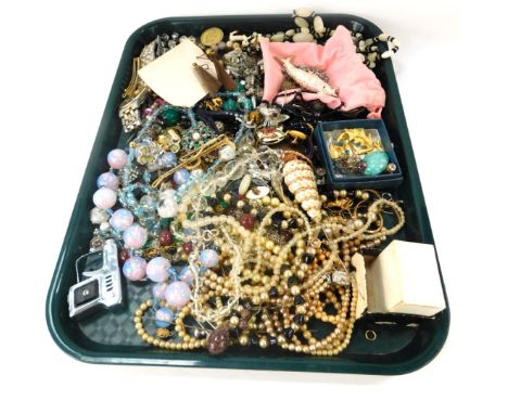 A group of costume jewellery, comprising a silver and paste stone set basket brooch, cultured pearl necklaces, hat pins, dres