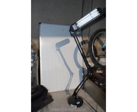 A whiteboard and fluorescent desk lamp (working at time of lotting).