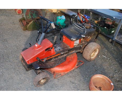 An Ariens RM828 ride on mower with 26" deck - engine turns.