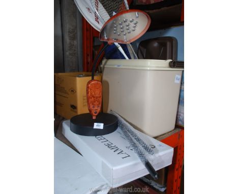 A modern battery operated desk lamp.