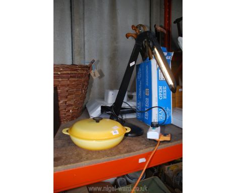 A Le Creuset yellow casserole dish (cracked lid), and an angle poise lamp (working order).