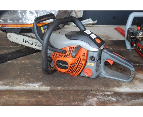 A Hitachi chainsaw.