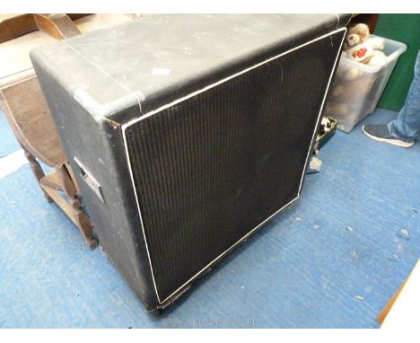 A large Speaker by Dallas Arbiter Ltd. 30" x 13" x 33".