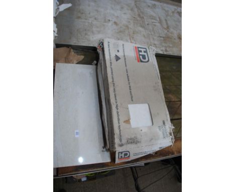 18 ceramic floor tiles, 12" x 23 1/2".