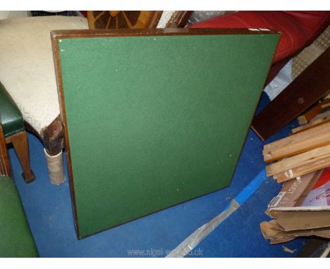 A green baize card table with fold up legs, 30" square.