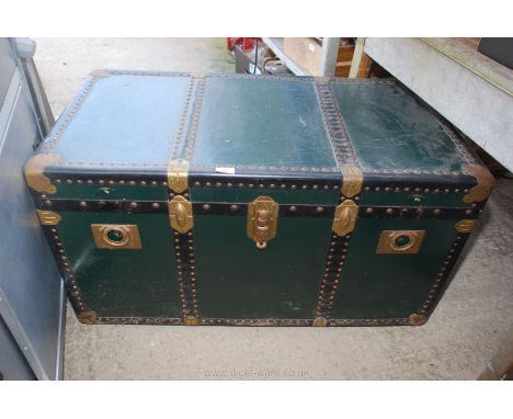 A steamer/trunk, 39" long x 21 1/2" deep x 21" high.