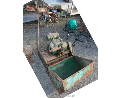 A Ransomes cylinder mower with a Villiers petrol kick-start engine, (engine turns).