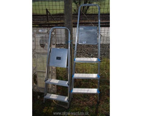 Two step ladders; a four rung and three rung.