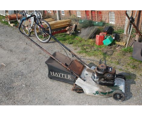 A 'Hayter' mower with Briggs &amp; Stratton engine (engine turns over).