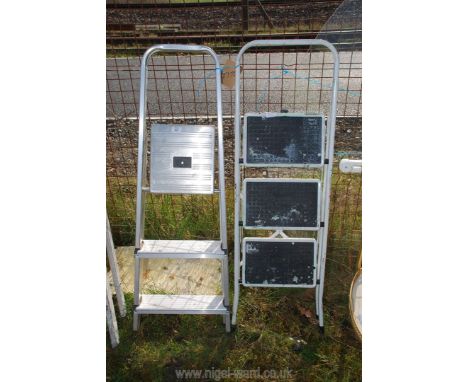 2 x three rung step ladders; one steel, one aluminium.