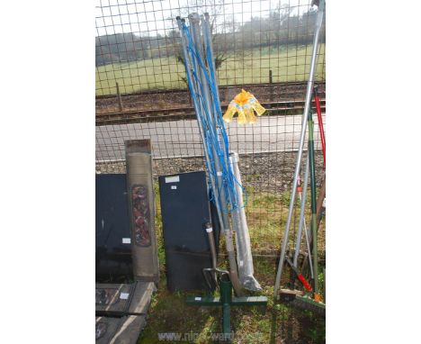 A stainless steel fork, a stand and a three arm rotary line.