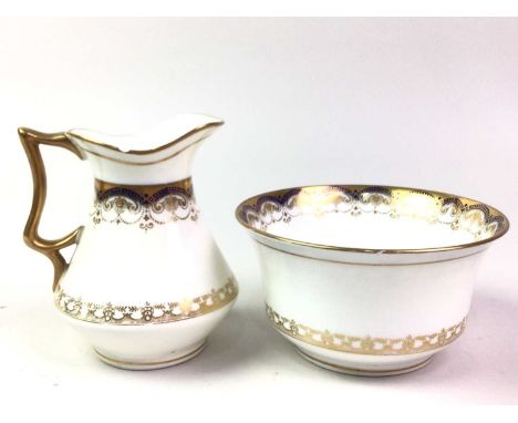 BLUE AND GILT DECORATED TEA SERVICE, including cups, saucers, sugar and cream and two biscuit plates