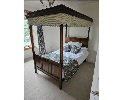 OAK FOUR POSTER BED, with square section supports and panelled head and foot boardsthe canopy 216cm x 135cm base of bed is 12