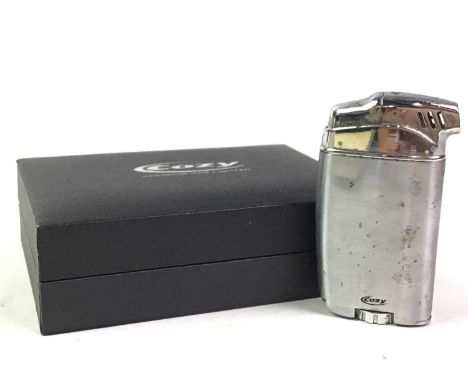 FOUR VINTAGE CIGARETTE LIGHTERS, including two by Corona and another by CozyQty: 3
