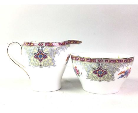 TWO PART TEA SERVICES, comprising a Royal Worcester dragon design and Paragon Rockingham pattern