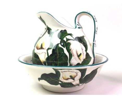 GRISELDA HILL WEMYSS POTTERY JUG AND BASIN, AND A CAPODIMONTE SPILL  the jug and basin decorated with flowers and leaves on a