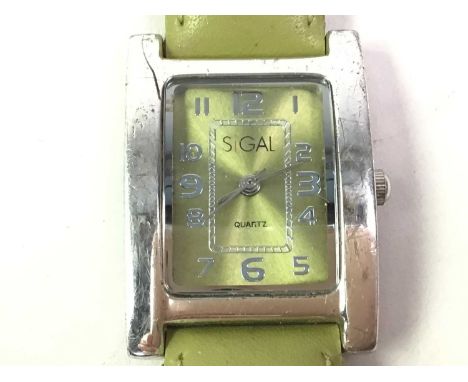 COLLECTION OF FASHION WRIST WATCHES, ALONG WITH A YELLOW METAL MOURNING STYLE BROOCH  including a nine carat gold cased watch