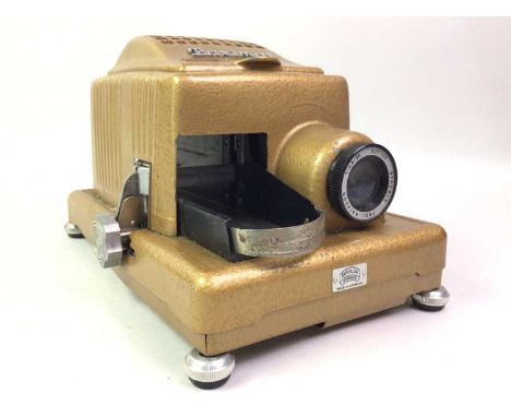 VINTAGE PAXIMAT PROJECTOR, AND OTHER ITEMS  including a Chinese medallion, brassware, a glass souvenir desk weight, a silver 