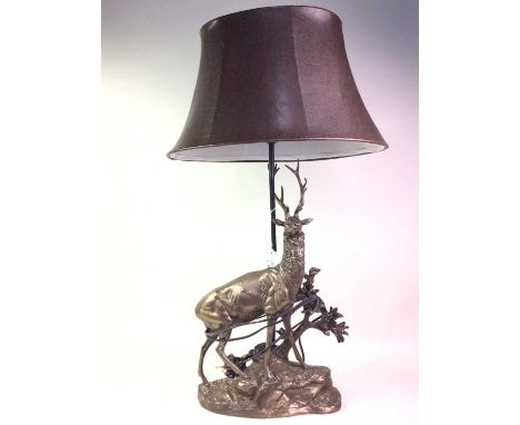 CAST METAL STAG TABLE LAMP, LATE 20TH CENTURY  formed as a stag stood on a rocky plateau, with simulated leather shade82cm hi