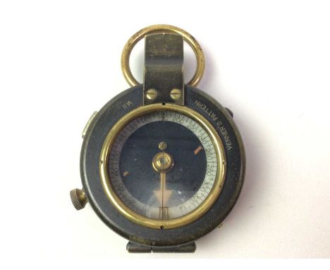 WWI PRISMATIC COMPASS, ALONG WITH A LEATHER BOUND PRIEST the compass in a leather carry caseQty: 2