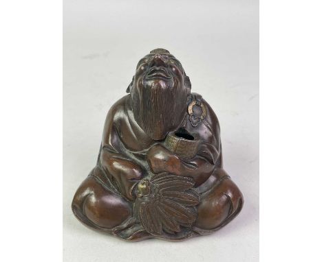CHINESE INK POT, AND OTHER ASIAN ITEMS, modelled as a Buddha, along with two Chinese tokens, a small jade pendant and a small