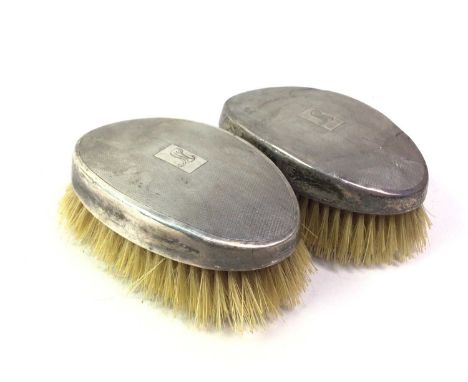 TWO SILVER BACKED HAIRBRUSHES AND OTHERS, CHESTER 1938 with engine turned backs along with a clothes brush, silver cigarette 