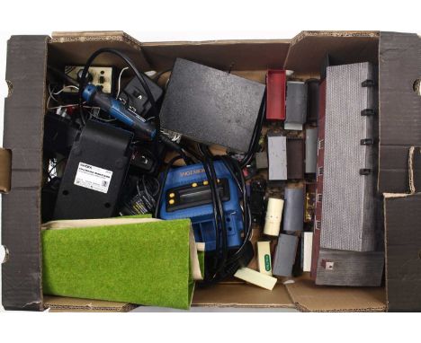 A collection of 00 gauge locos, wagons, buildings and controllers, including a J72 in BR black, no.68745, a 4F, loose cab, a 