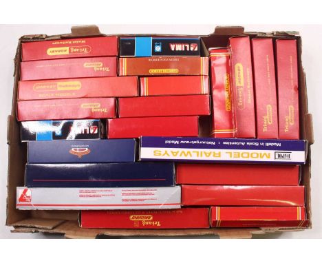A large tray containing 00 gauge wagons by various manufacturers, including a Dapol track cleaning wagon, a Bachmann nuclear 