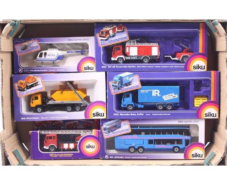 One tray containing six various window boxed Siku diecast vehicles to include No. 2826 Skip lorry, No. 2819 Fire Engine, No. 