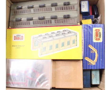 Two boxes of Hornby Dublo accessories, empty boxes, and others, all in very good condition, including an engine shed, with bo