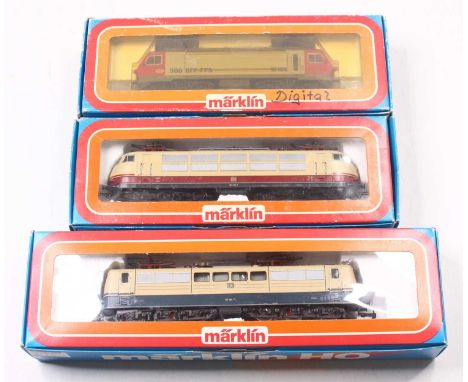 Three Marklin HO gauge locos to include a DB BR 151 in cream and blue livery, no.151104-7, a DB BR 103, in red and cream live
