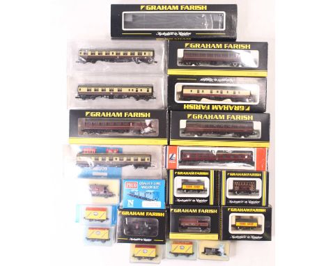 A collection of N gauge rolling stock to include three GWR BR Mk1 coaches, three suburban Midland region coaches, a BR Mk1 fu