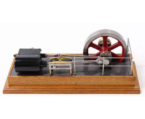 A stationary steam engine, believed to be scratch-built, comprising a large six-spoke flywheel, a single cylinder, slide bars