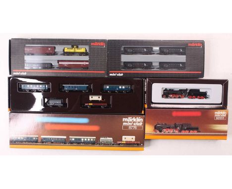One Marklin Mini Club Z gauge loco and a collection of wagons, including a DB BR 38, in black, a set of 4 hopper wagons, a se
