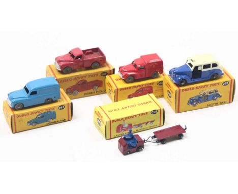 Five Dublo Dinky Toys: 067 Austin Taxi, black treaded wheels (M) (BNM); 068 Royal Mail van, grey treaded wheels (NM) (BNM); 0